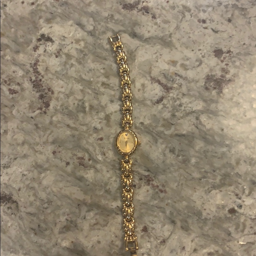 Bulova gold woman’s watch